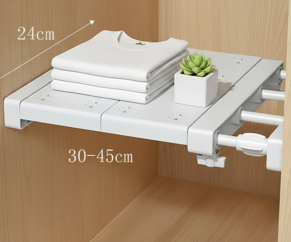 Foldable shelf attached to a wooden cabinet with measurement labels.